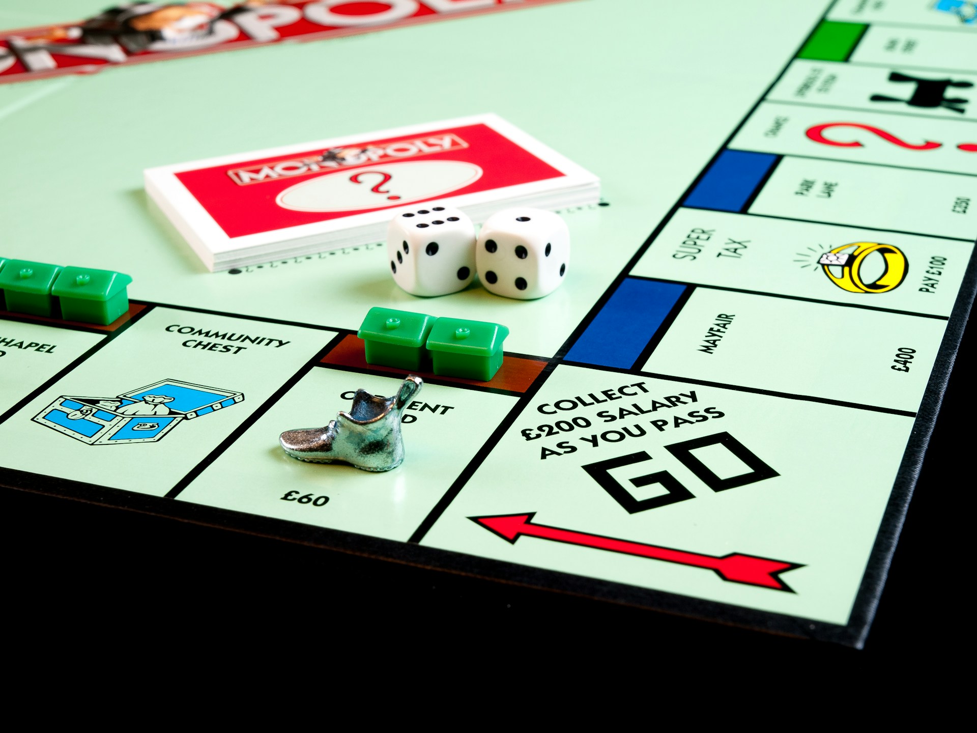 A close-up of a Monopoly board game
